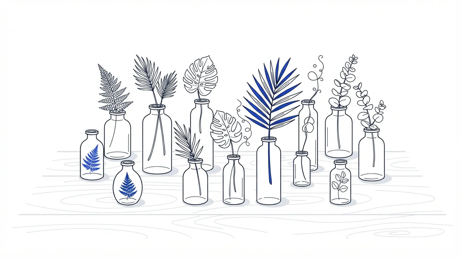 An overhead view of clear glass vials with various botanicals on a light wooden surface.